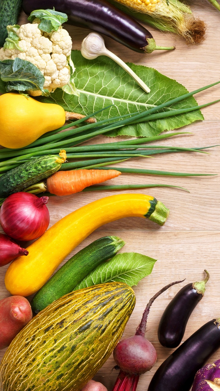 Brown Wooden Chopping Board Beside Green and Purple Vegetables. Wallpaper in 720x1280 Resolution