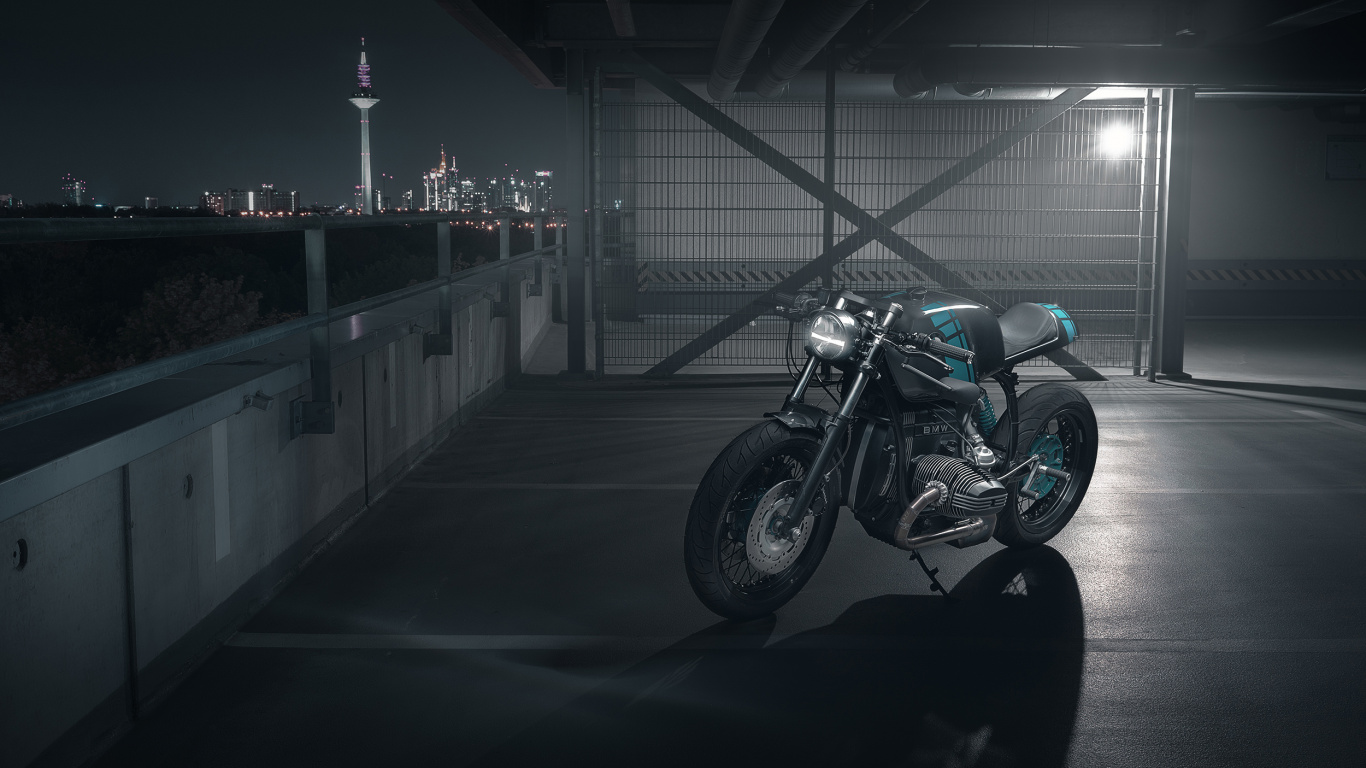 Black and Silver Motorcycle Parked on Gray Concrete Floor. Wallpaper in 1366x768 Resolution