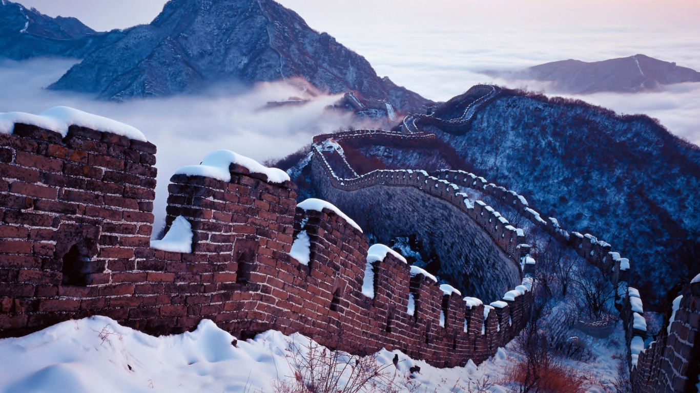 Brown Brick Wall on Snow Covered Mountain During Daytime. Wallpaper in 1366x768 Resolution
