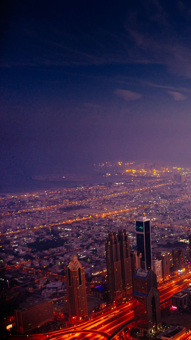 Horizonte de la Ciudad Durante la Noche. Wallpaper in 750x1334 Resolution