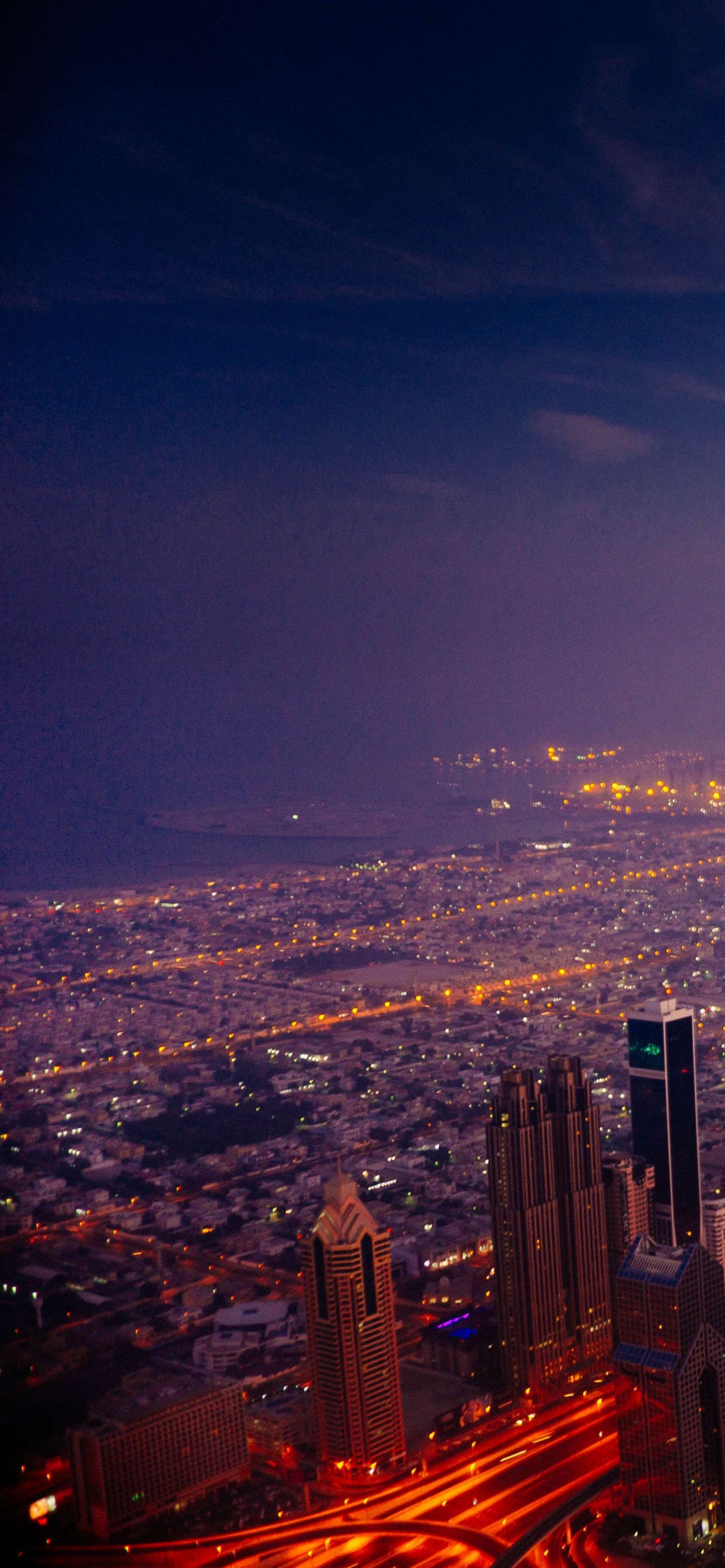 City Skyline During Night Time. Wallpaper in 1242x2688 Resolution