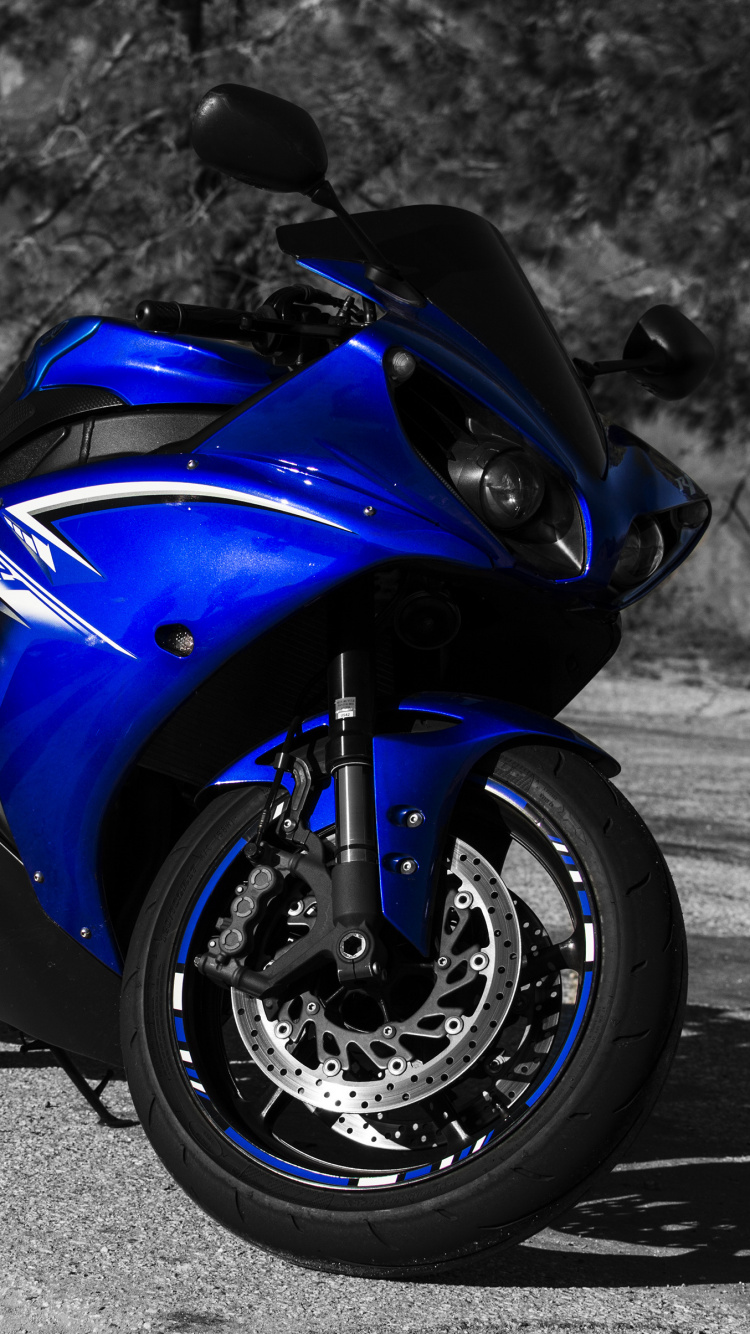 Blue and Black Sports Bike on Road. Wallpaper in 750x1334 Resolution