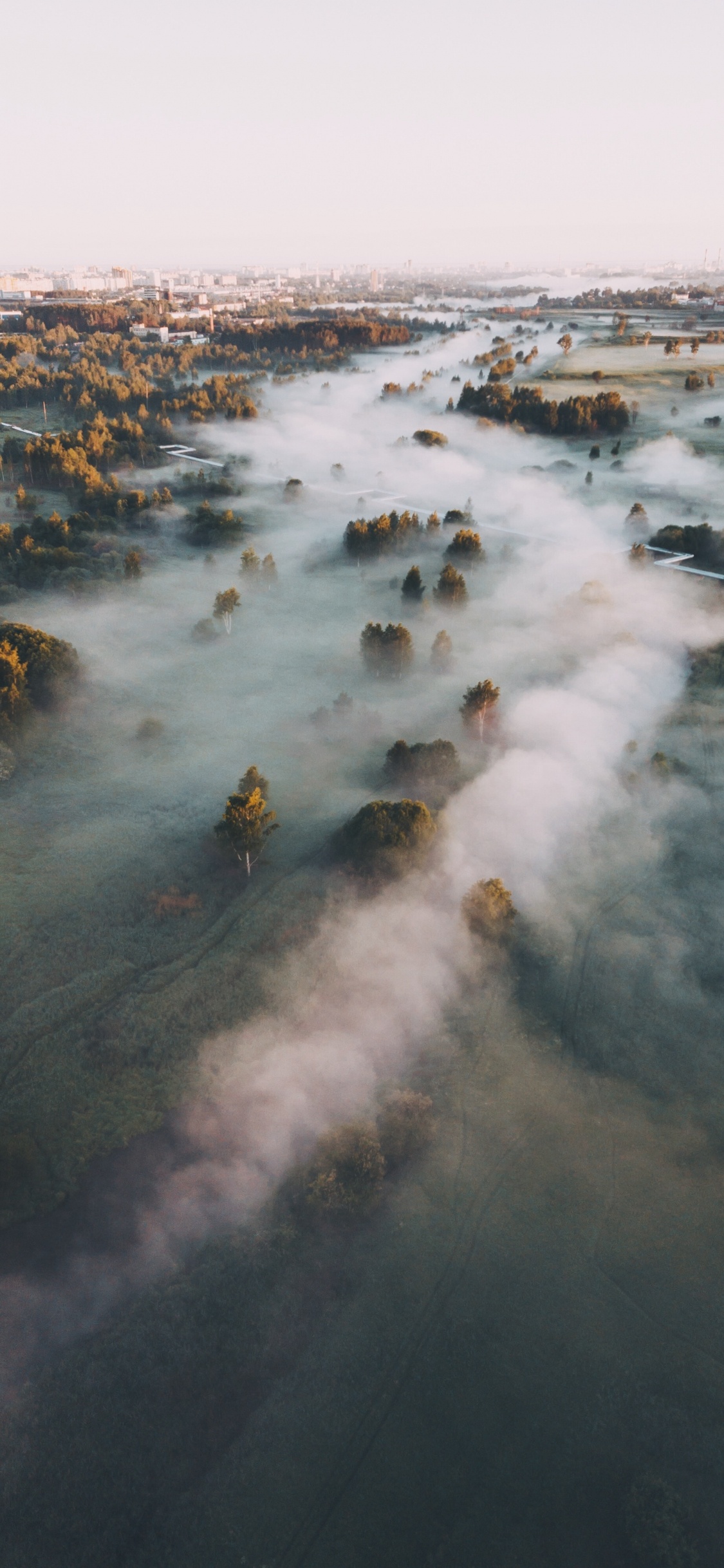 Birds Eye View of a Lake. Wallpaper in 1125x2436 Resolution