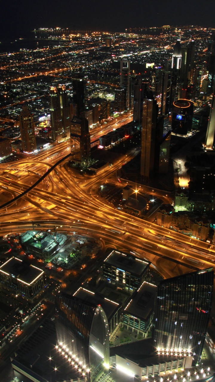 Aerial View of City During Night Time. Wallpaper in 720x1280 Resolution