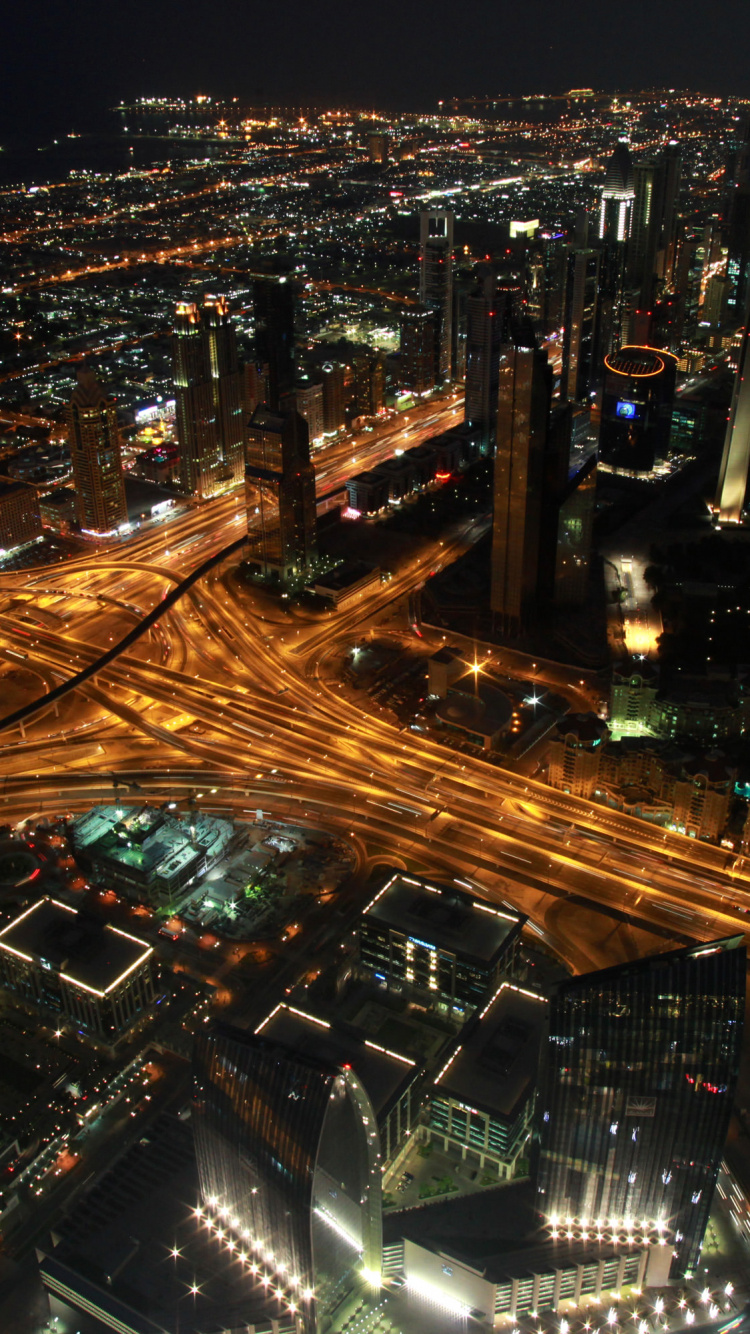 Aerial View of City During Night Time. Wallpaper in 750x1334 Resolution