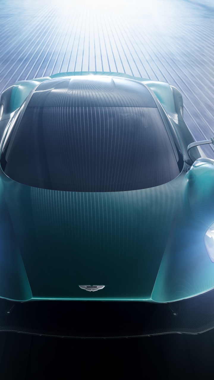 Voiture de Sport Blanche et Noire. Wallpaper in 720x1280 Resolution