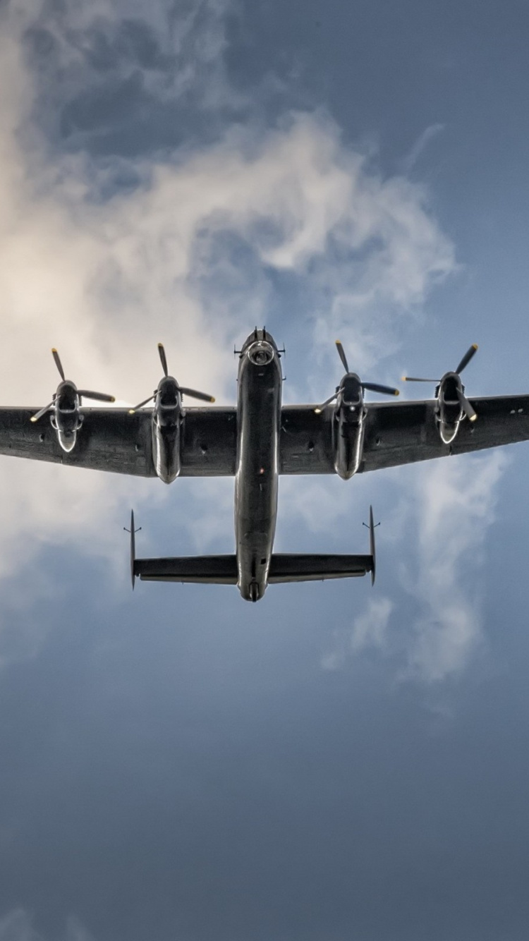Black Jet Plane in Mid Air During Daytime. Wallpaper in 750x1334 Resolution