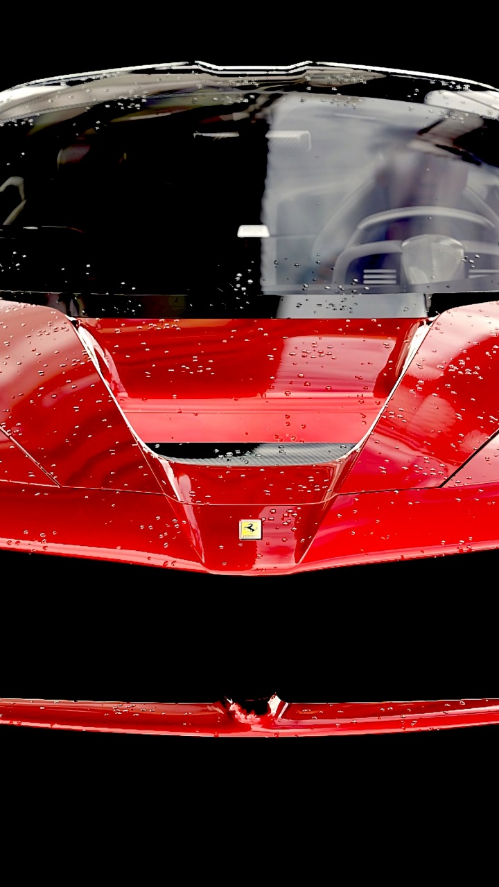 Roter Ferrari-Sportwagen in Nahaufnahme. Wallpaper in 720x1280 Resolution