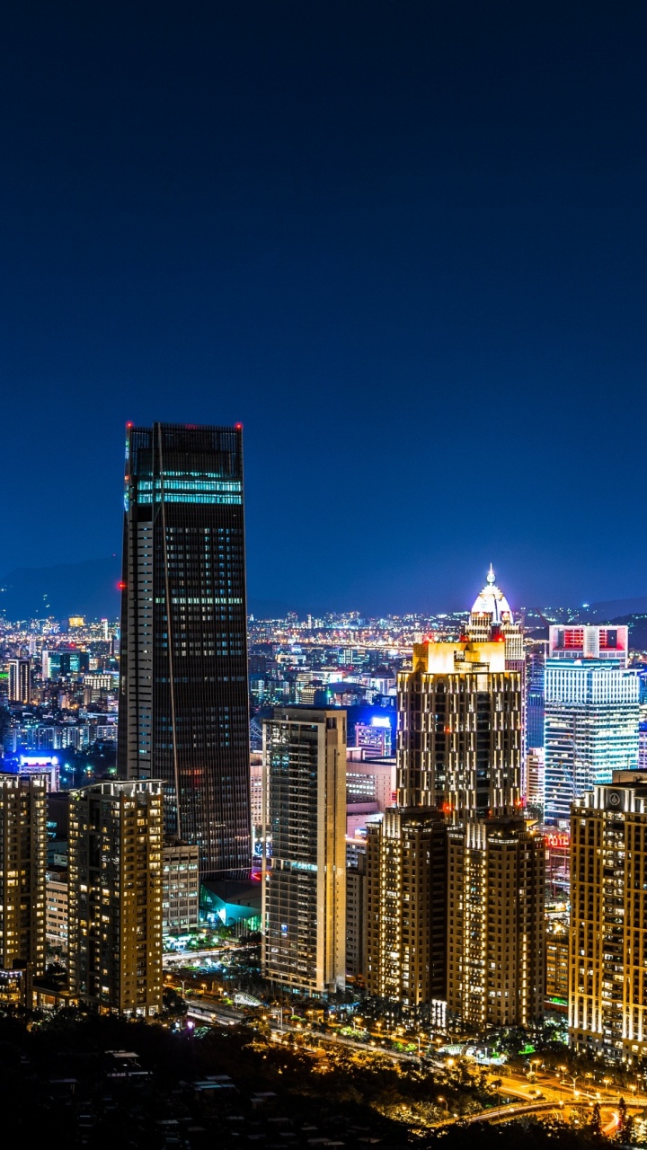 City Skyline During Night Time. Wallpaper in 720x1280 Resolution