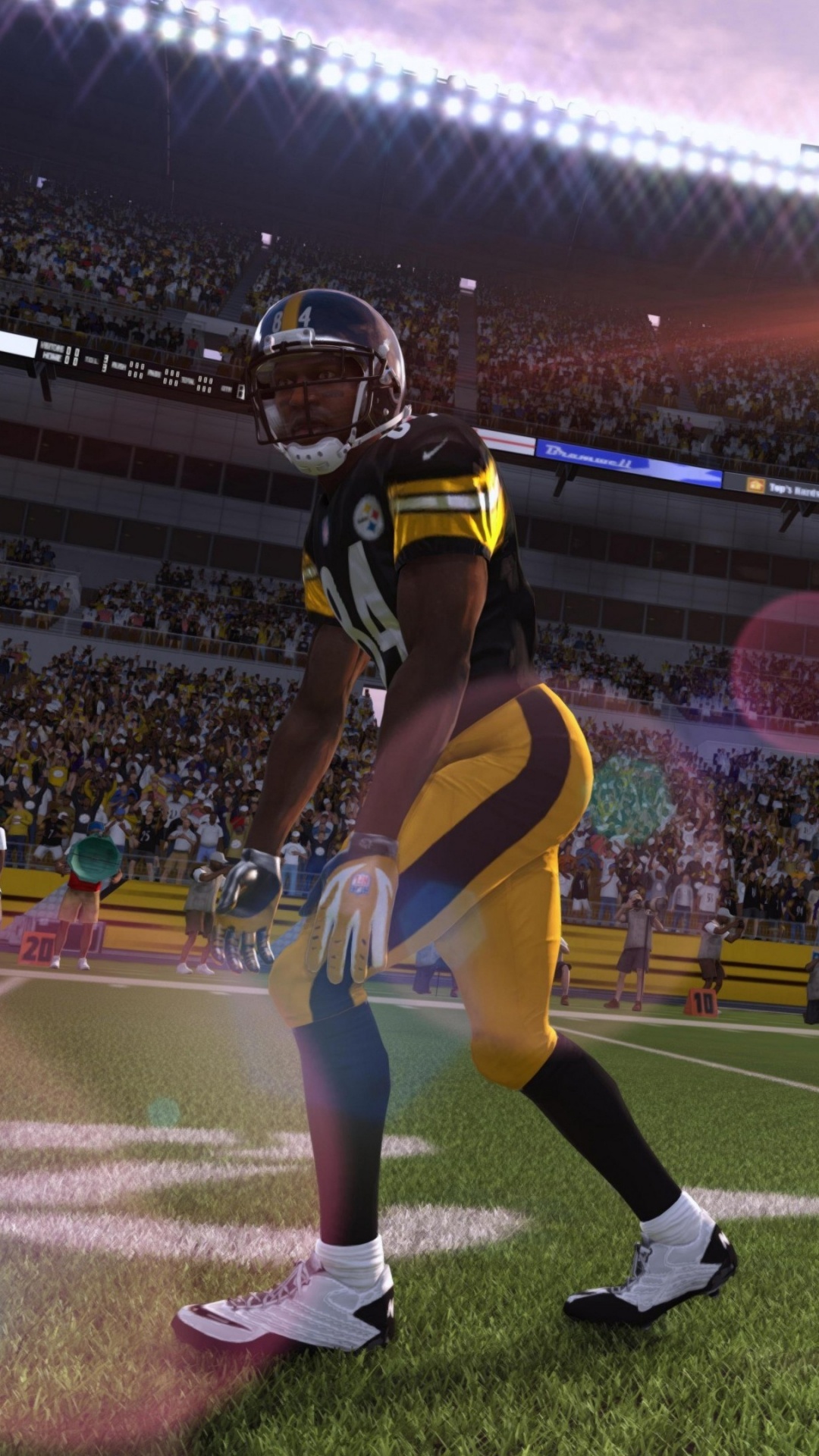 Football Players on Field During Nighttime. Wallpaper in 1080x1920 Resolution