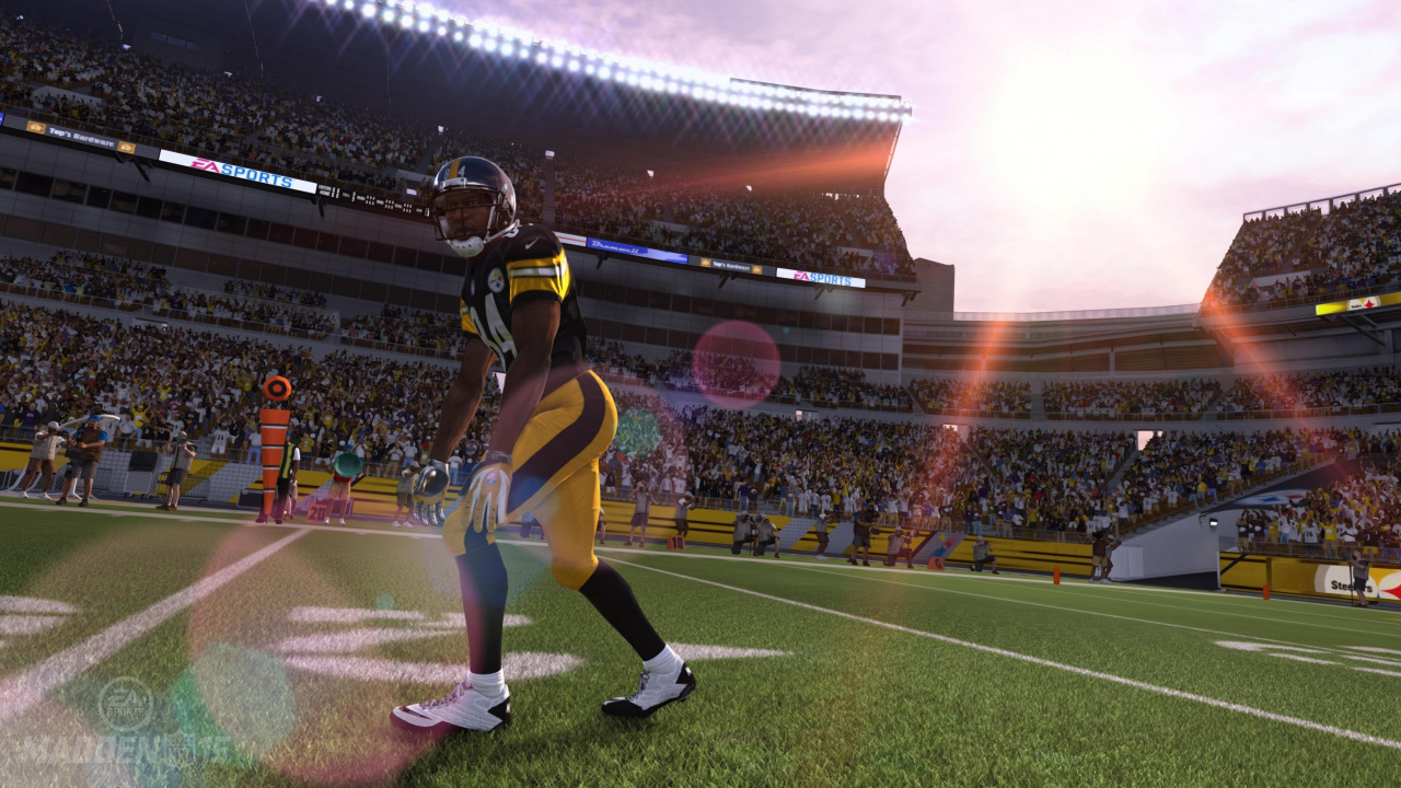 Football Players on Field During Nighttime. Wallpaper in 1280x720 Resolution