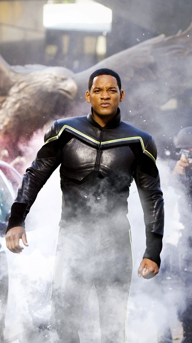 L'homme en Costume Noir et Blanc Debout Sur un Sol Couvert de Neige. Wallpaper in 750x1334 Resolution