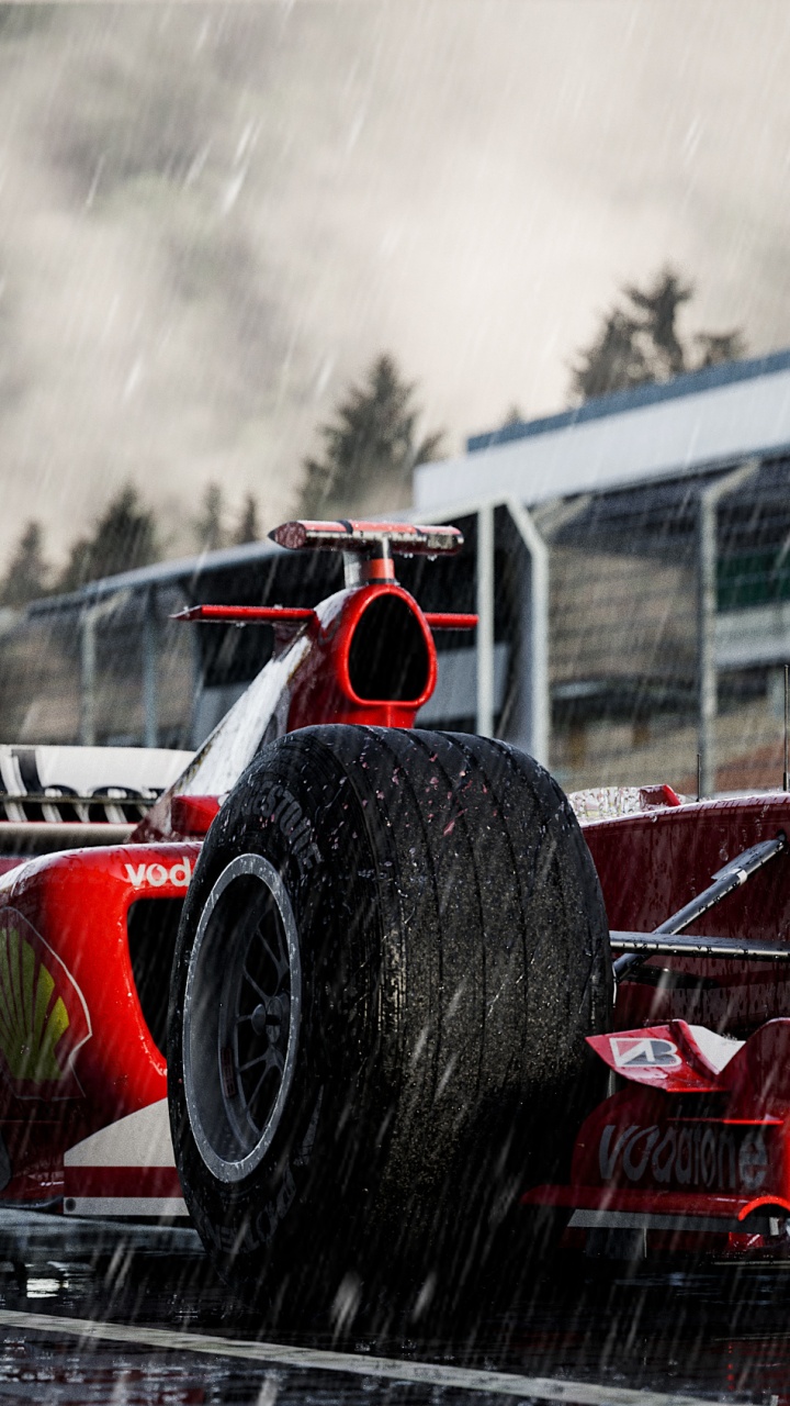 Man in Red Suit Riding Red Sports Car. Wallpaper in 720x1280 Resolution