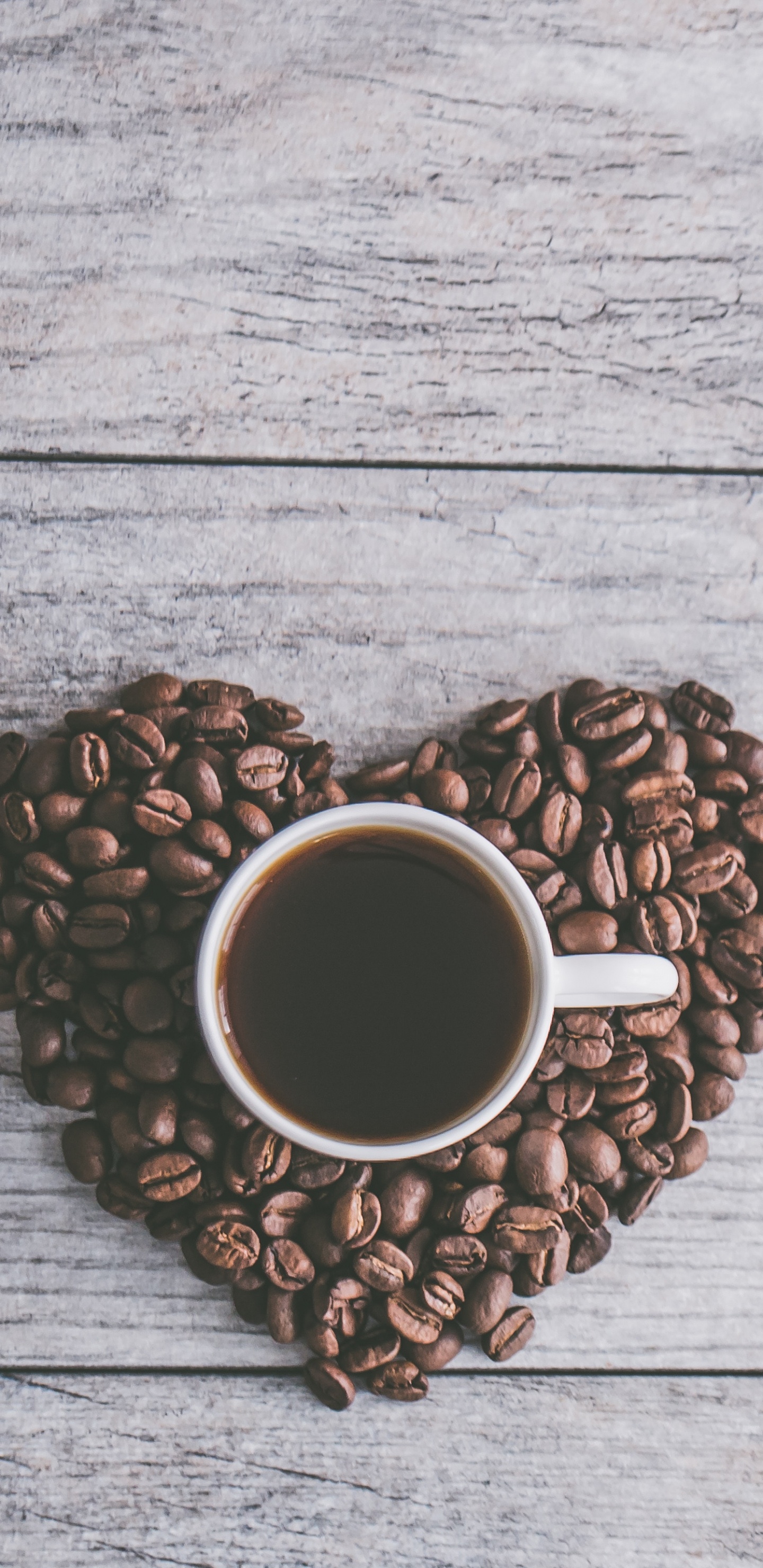 White Ceramic Mug on Brown Coffee Beans. Wallpaper in 1440x2960 Resolution