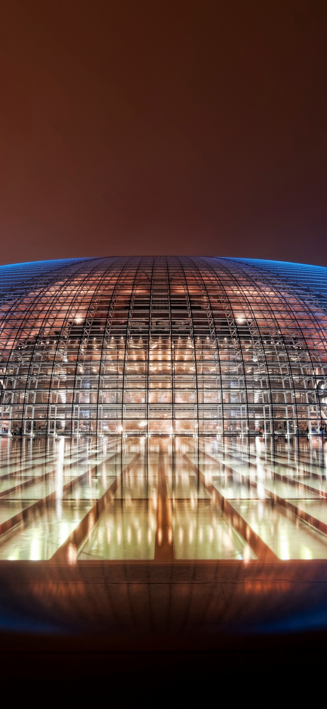 Gebäude Aus Blauem Und Braunem Glas. Wallpaper in 1125x2436 Resolution