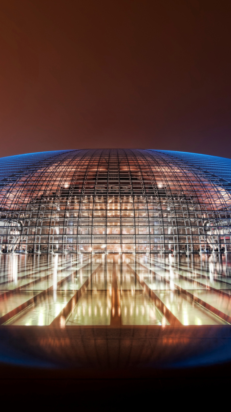 Gebäude Aus Blauem Und Braunem Glas. Wallpaper in 750x1334 Resolution