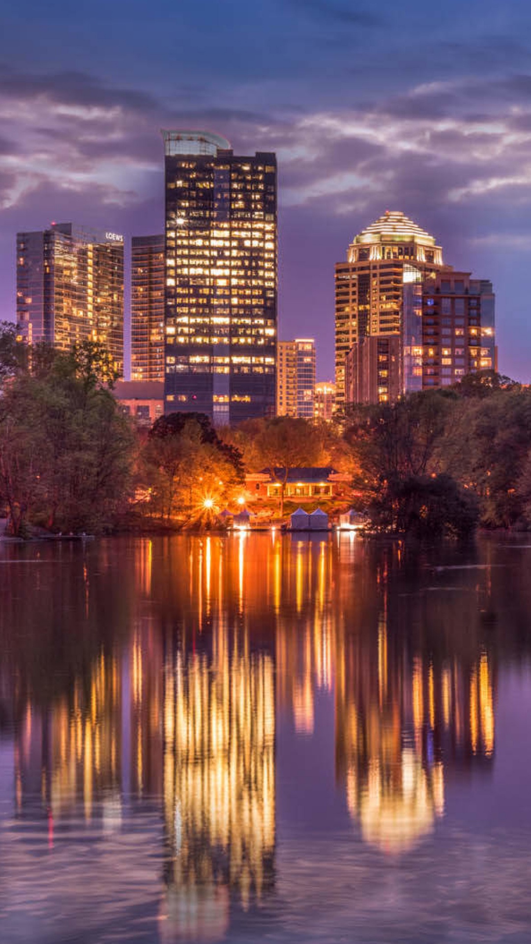 Body of Water Near City Buildings During Night Time. Wallpaper in 1080x1920 Resolution