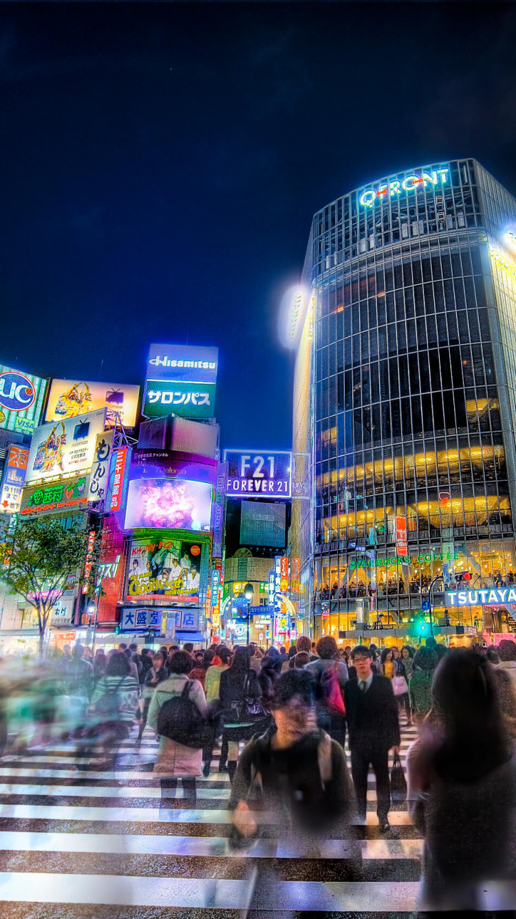 People Walking on Street During Nighttime. Wallpaper in 750x1334 Resolution