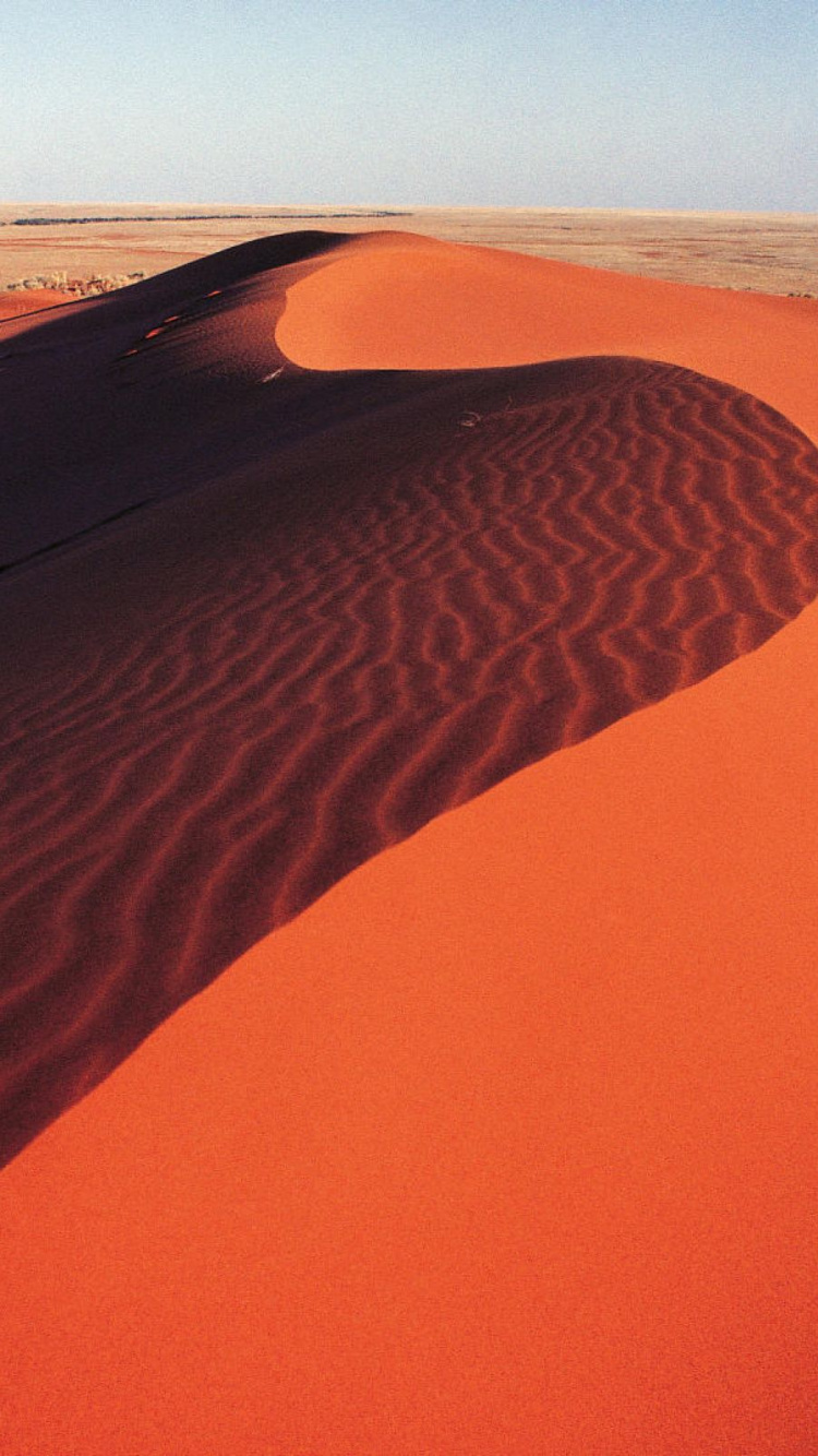Brown Sand Field During Daytime. Wallpaper in 750x1334 Resolution