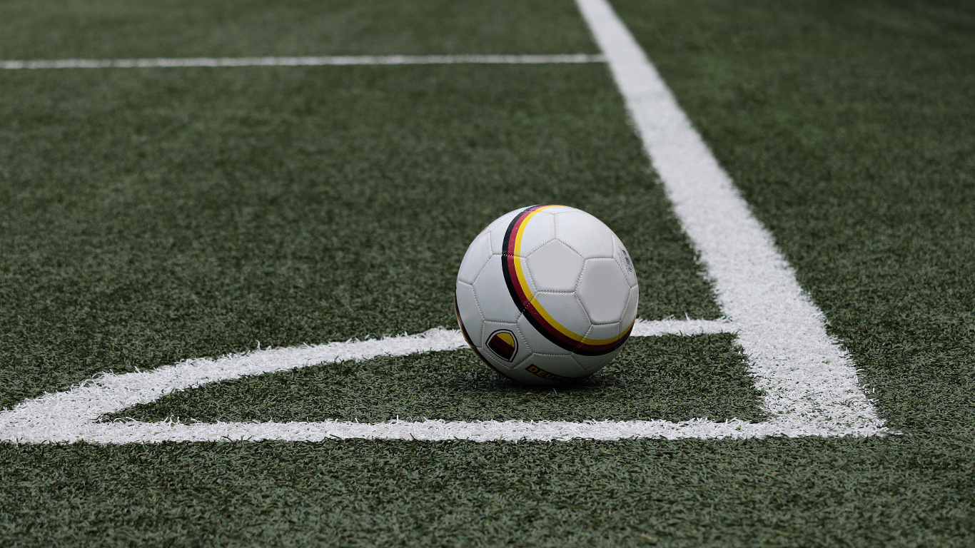 White and Yellow Soccer Ball on Green Field. Wallpaper in 1366x768 Resolution