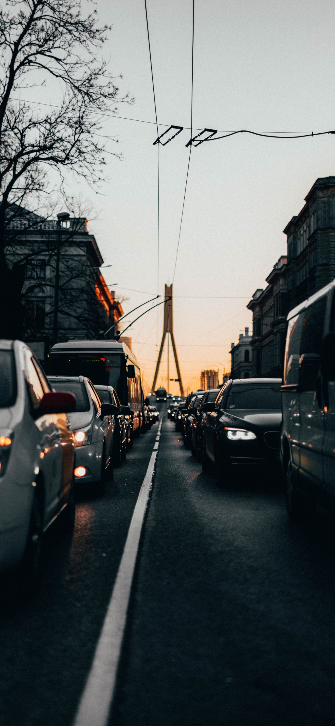Cars Parked on The Side of The Road During Daytime. Wallpaper in 1125x2436 Resolution