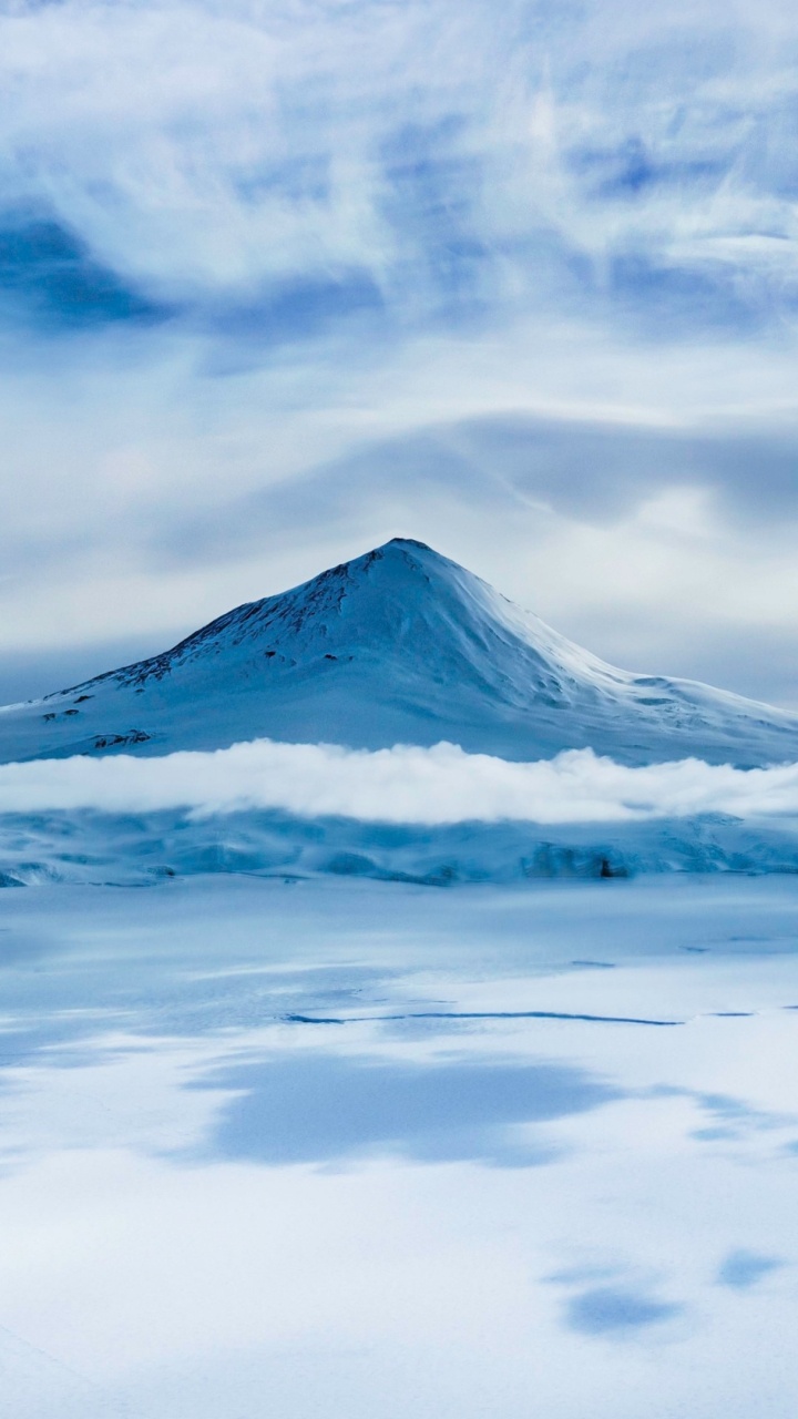 Snow Covered Mountain Under Cloudy Sky During Daytime. Wallpaper in 720x1280 Resolution