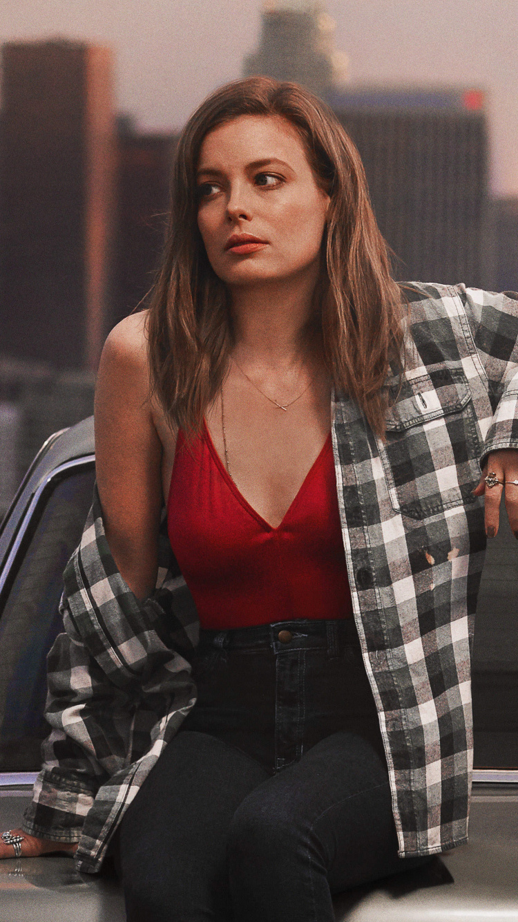 Woman in Red Tank Top Sitting Beside Man in Gray and Black Plaid Dress Shirt. Wallpaper in 750x1334 Resolution