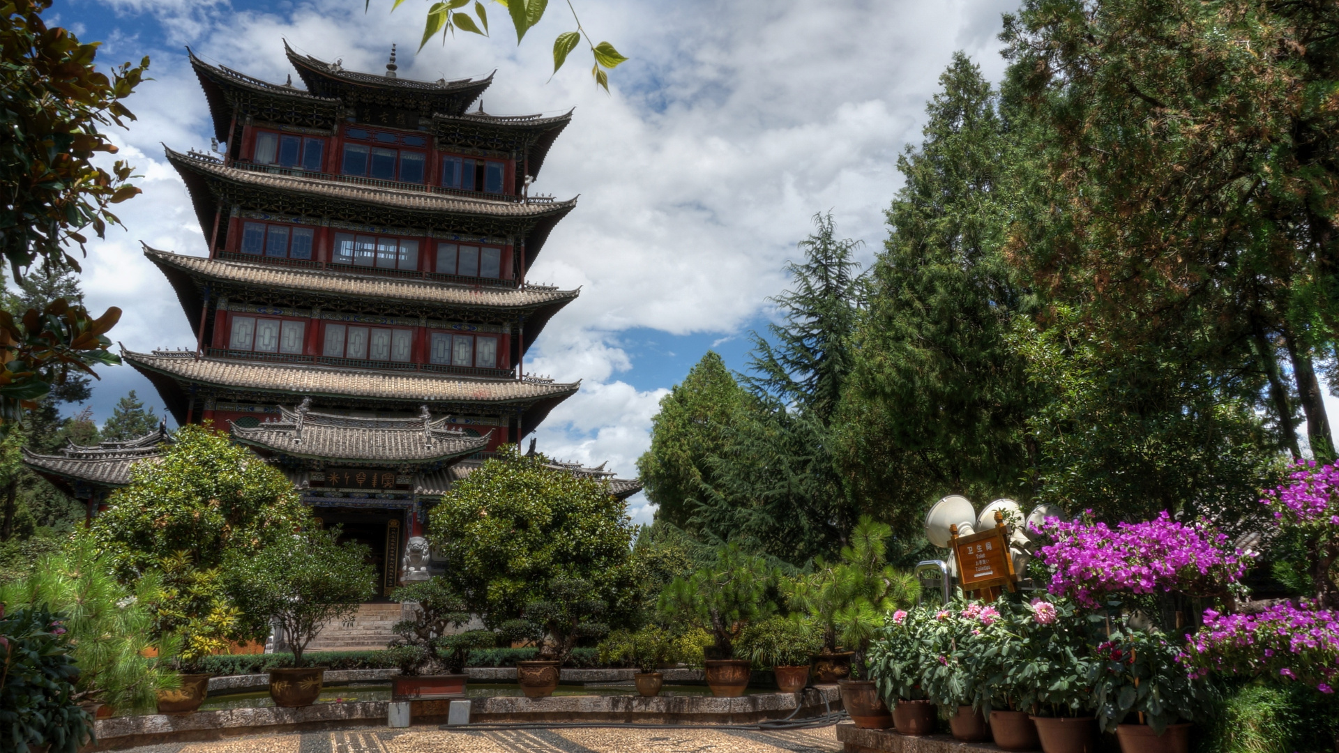 Brown and Black Temple Near Green Trees Under Blue Sky During Daytime. Wallpaper in 1920x1080 Resolution