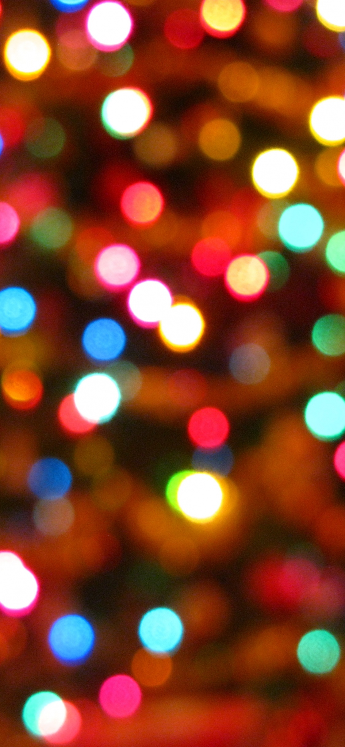 Rote Und Gelbe Bokeh-Lichter. Wallpaper in 1125x2436 Resolution