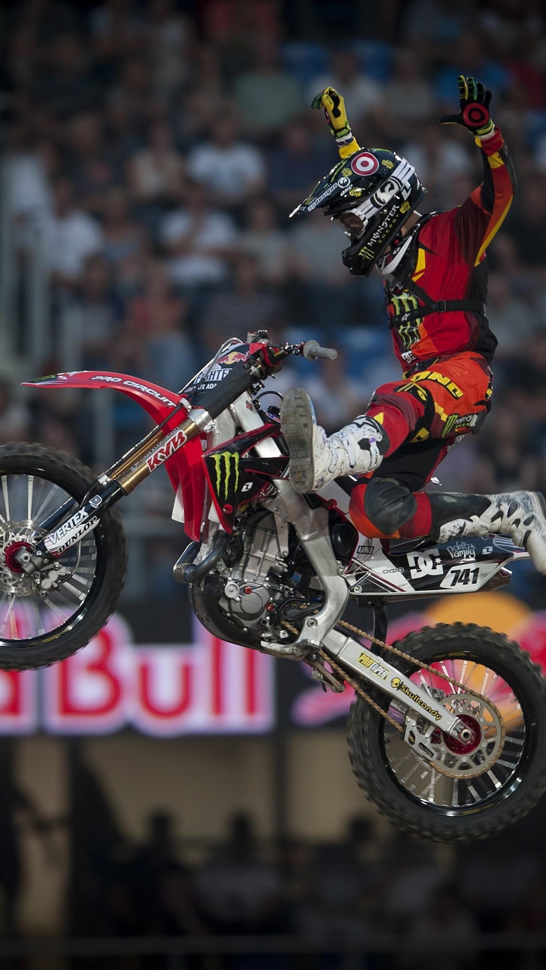 Man in Red and White Motocross Suit Riding Motocross Dirt Bike. Wallpaper in 1080x1920 Resolution