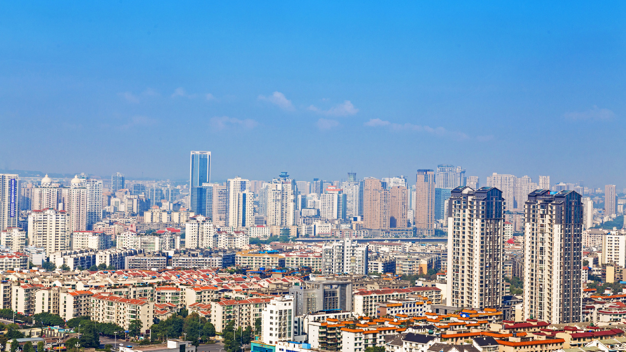City Skyline Under Blue Sky During Daytime. Wallpaper in 1280x720 Resolution