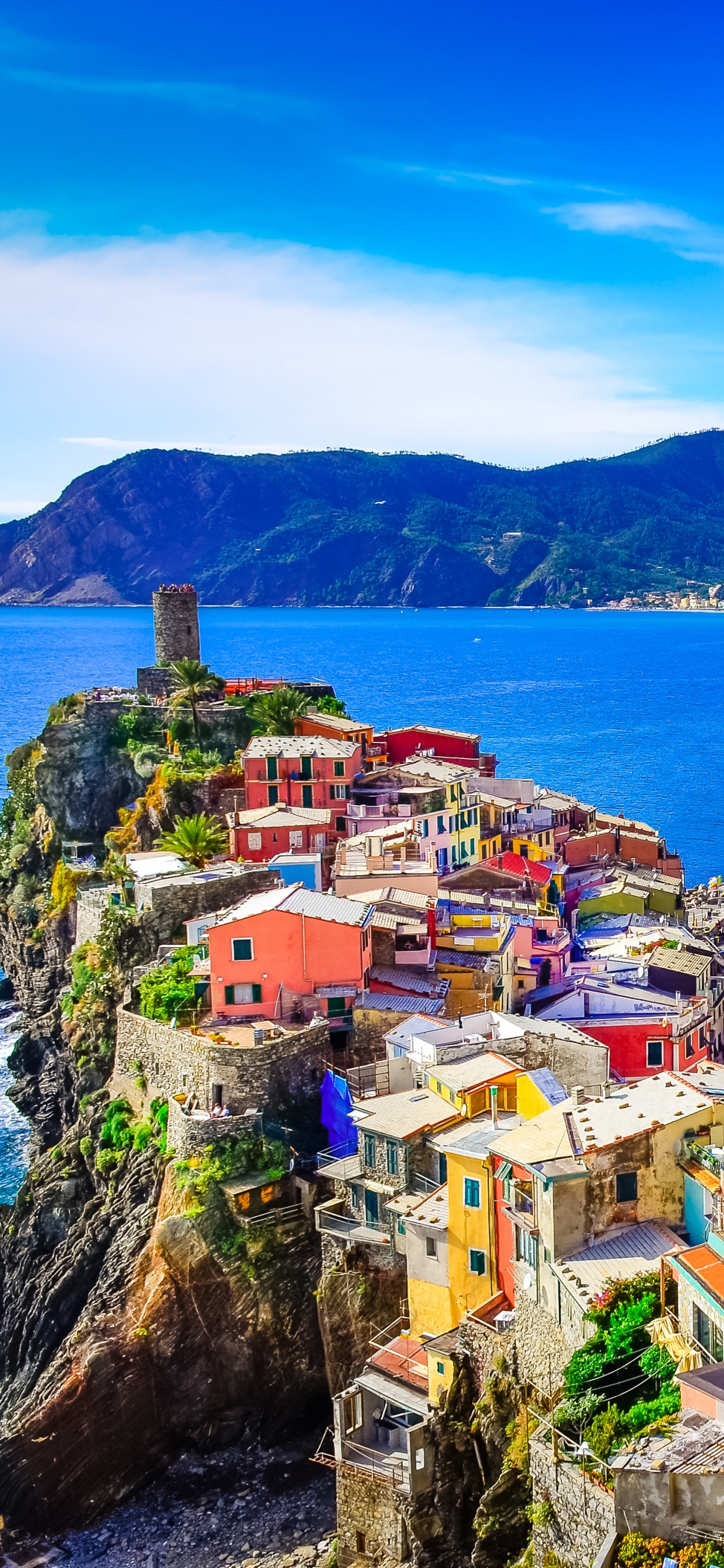 Houses on Mountain Near Body of Water During Daytime. Wallpaper in 1242x2688 Resolution