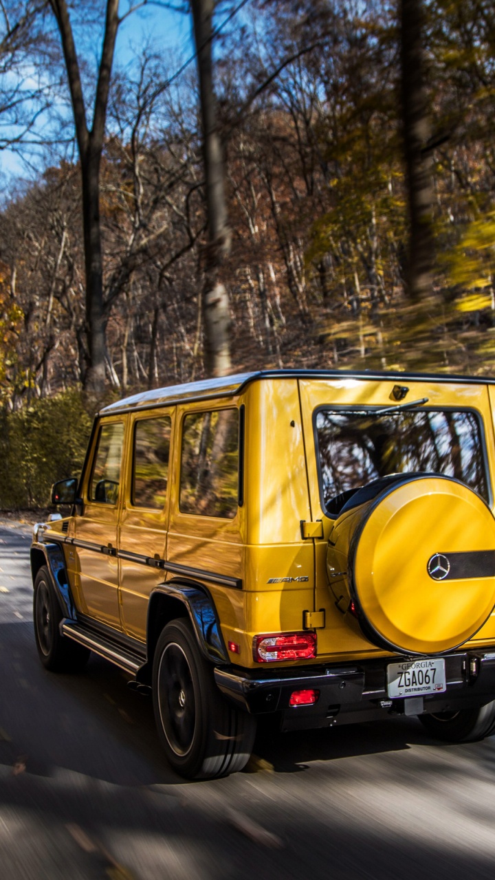 Yellow Van on Road During Daytime. Wallpaper in 720x1280 Resolution