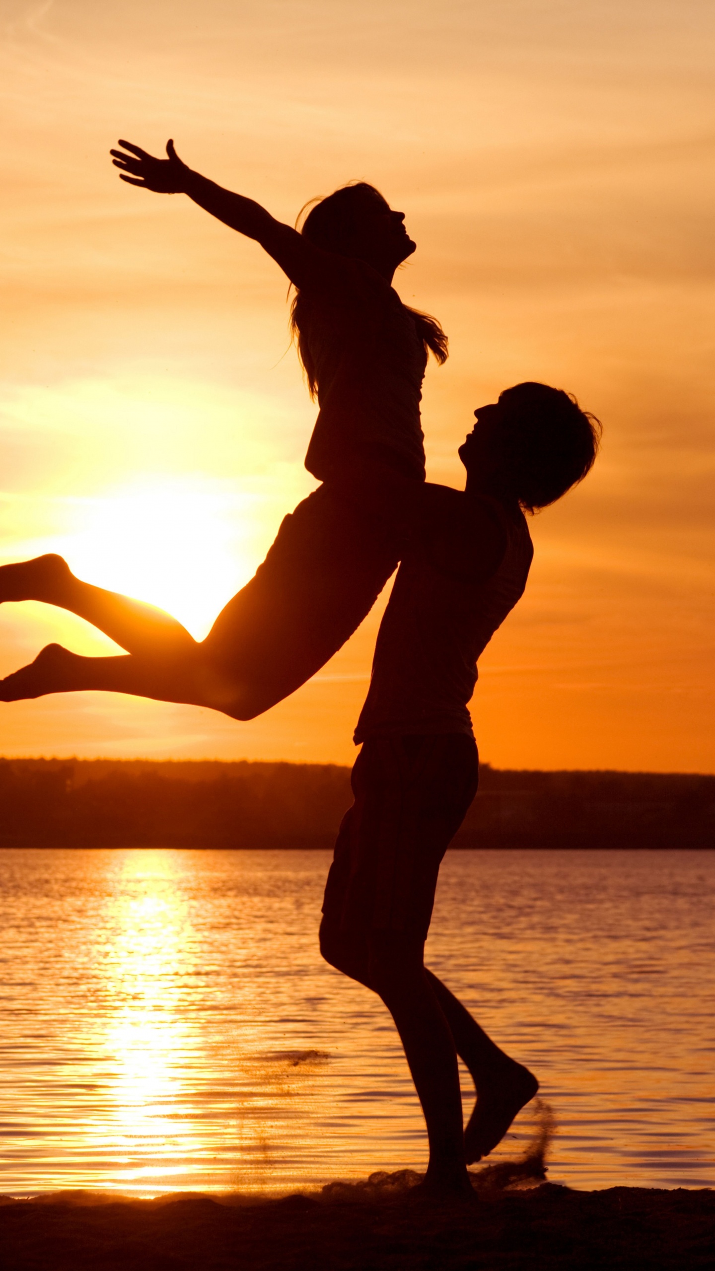 Romance, Water, Sunset, Fun, Jumping. Wallpaper in 1440x2560 Resolution