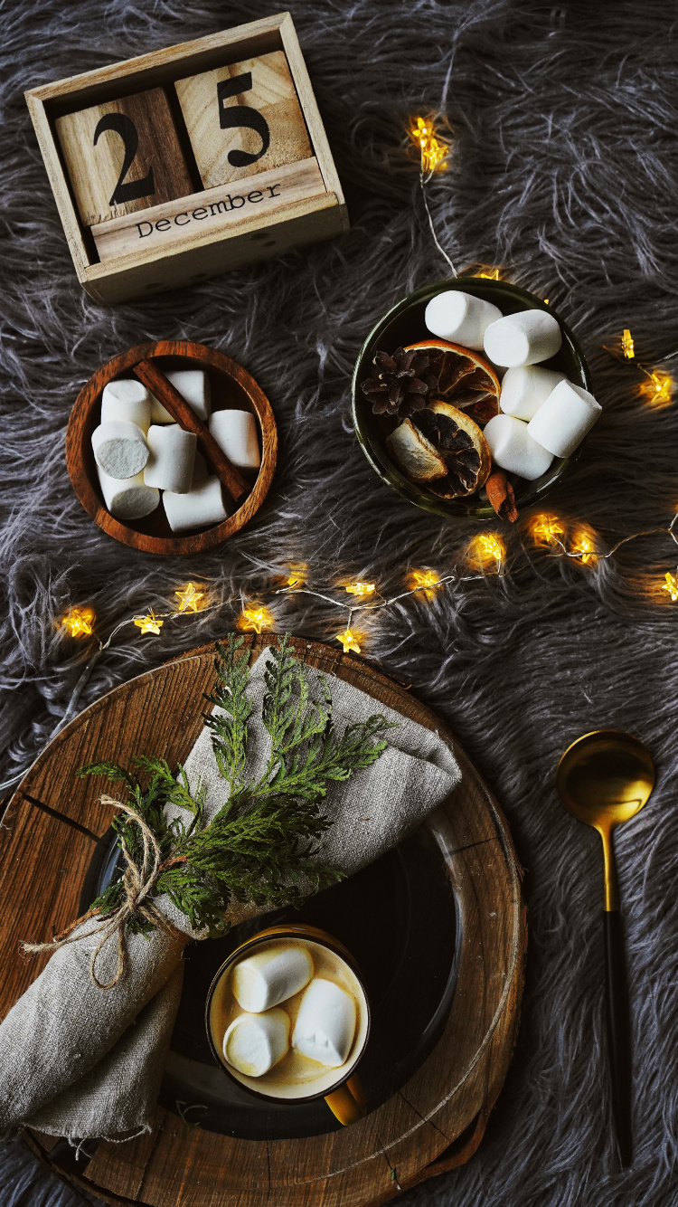 White and Brown Round Ornament on Gray Round Plate. Wallpaper in 750x1334 Resolution