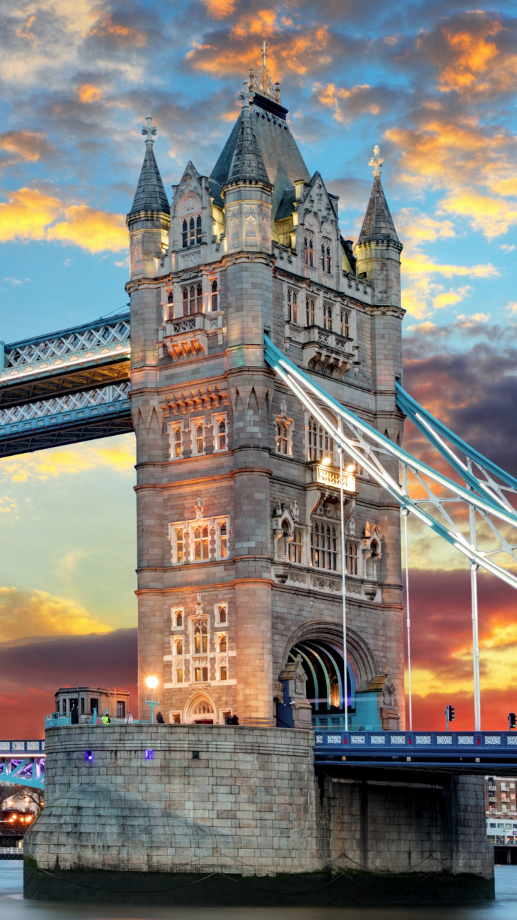 Bridge Over River During Night Time. Wallpaper in 750x1334 Resolution