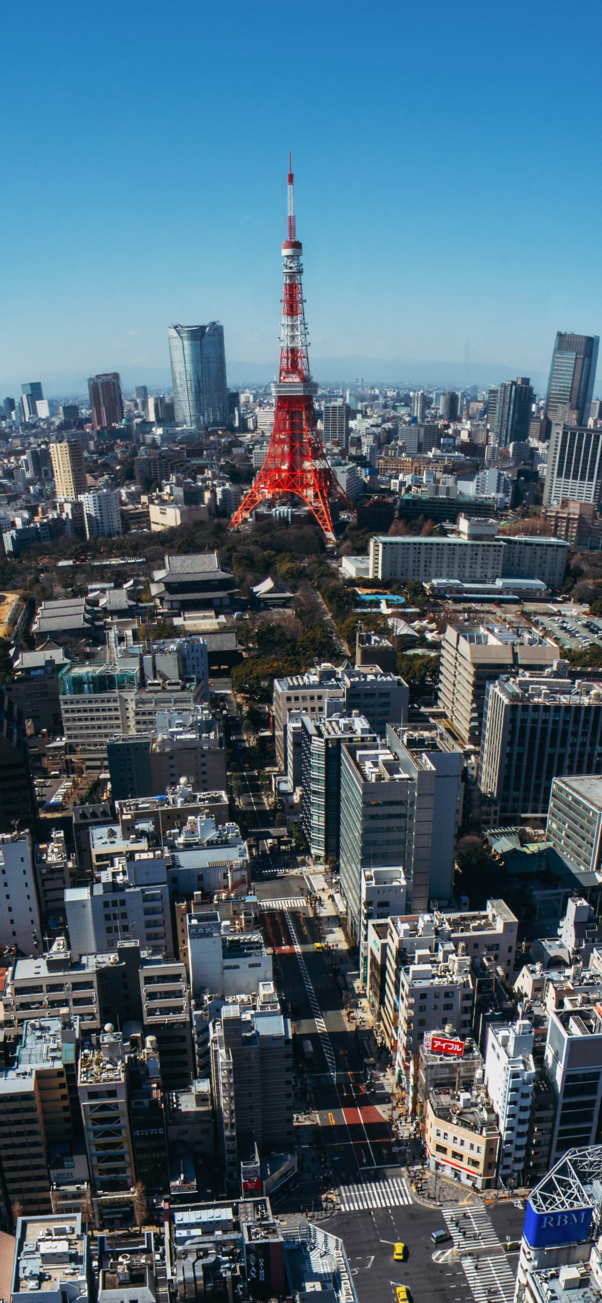 Red Tower in The City During Daytime. Wallpaper in 1242x2688 Resolution