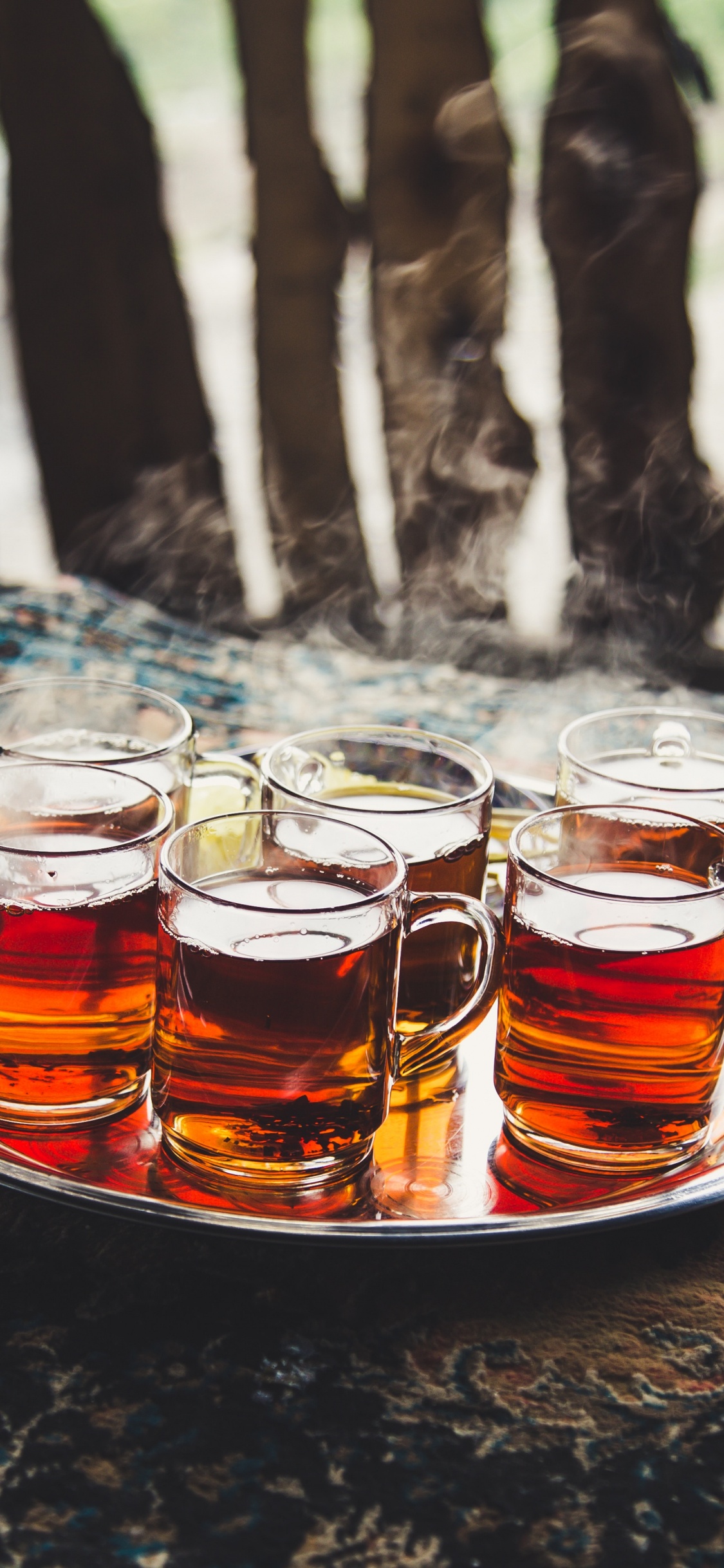 Clear Drinking Glasses on White Ceramic Plate. Wallpaper in 1125x2436 Resolution