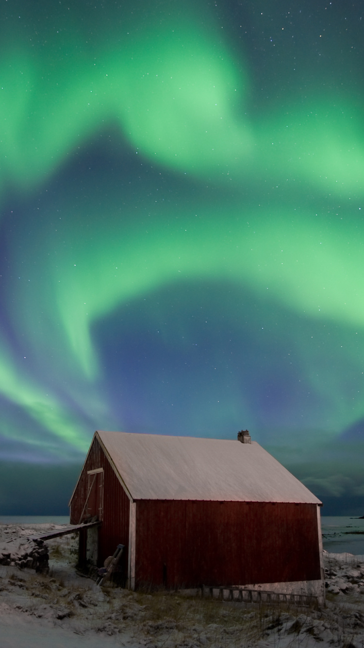 Brown Wooden Barn Under Green Sky. Wallpaper in 750x1334 Resolution