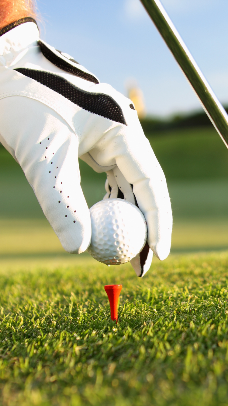 Person in White Pants and White Nike Shoes Holding Golf Club. Wallpaper in 750x1334 Resolution