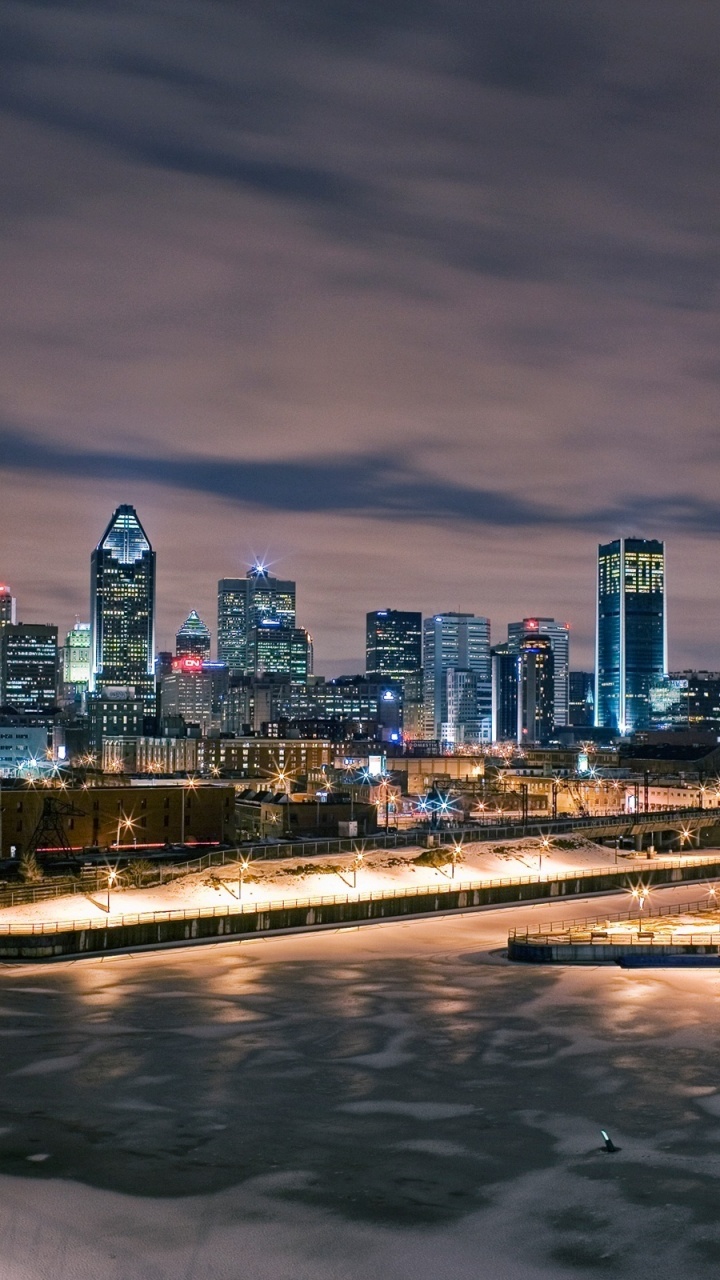 City Skyline During Night Time. Wallpaper in 720x1280 Resolution