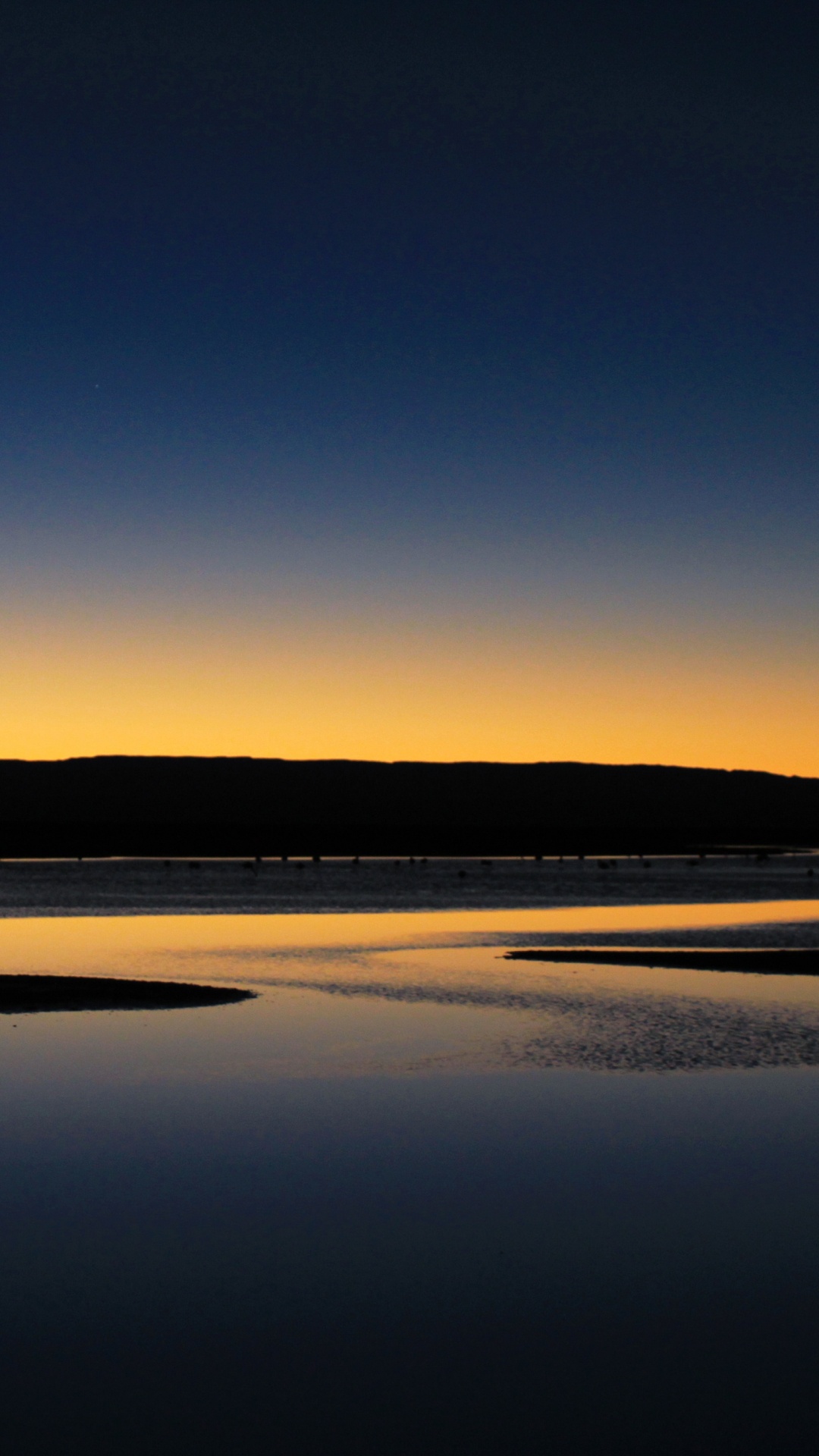 Silhouette of Mountain Near Body of Water During Daytime. Wallpaper in 1080x1920 Resolution