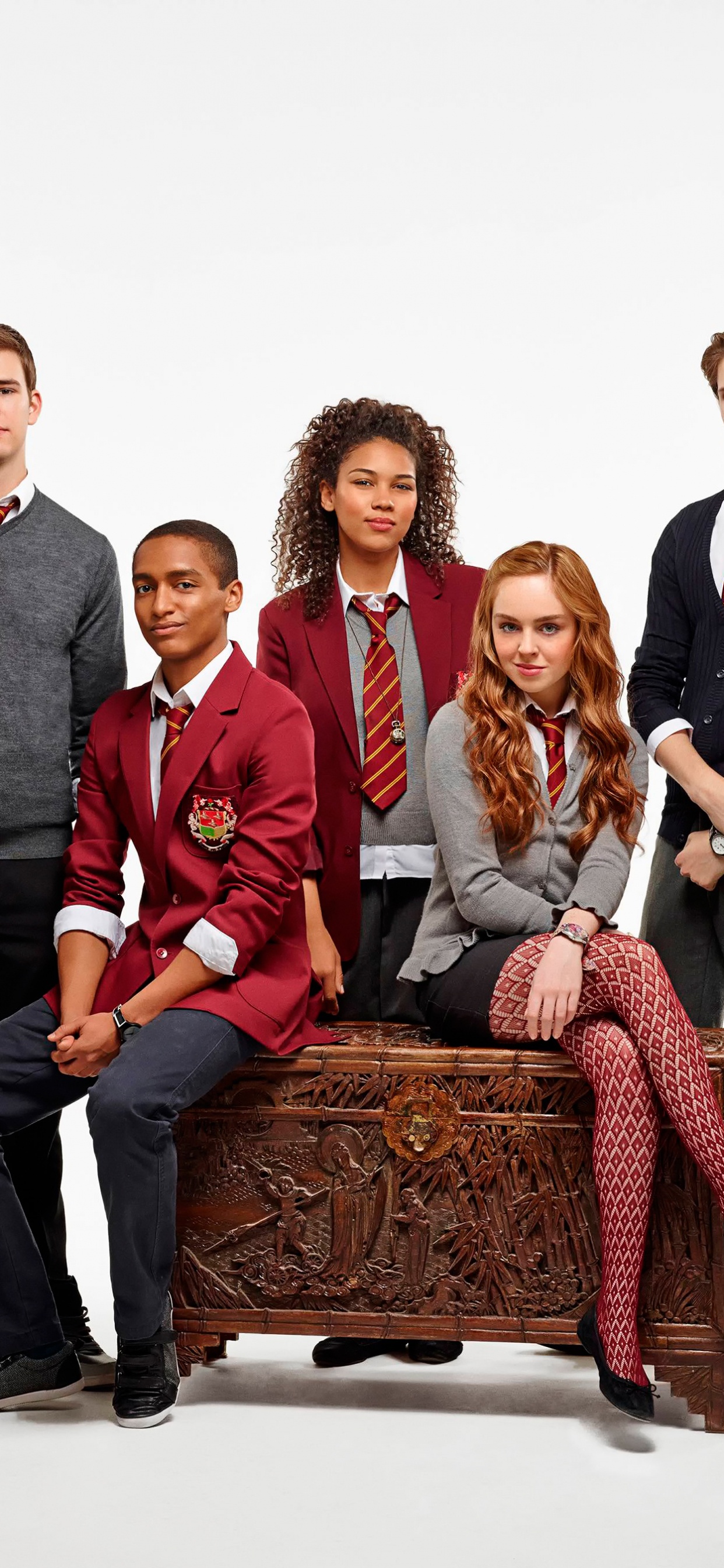 Group of People Sitting on Brown Wooden Bench. Wallpaper in 1242x2688 Resolution