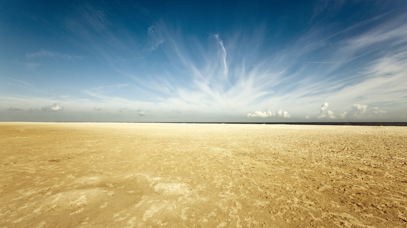 Brown Sand Under Blue Sky During Daytime. Wallpaper in 1366x768 Resolution