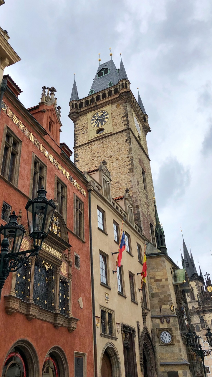 Download 720x1280 Wallpaper Old Town Square, Prague Astronomical Clock, Window, Facade, Spire Old Town Square, Prague Astronomical Clock, Window, Facade, Spire. Wallpaper in 720x1280 Resolution