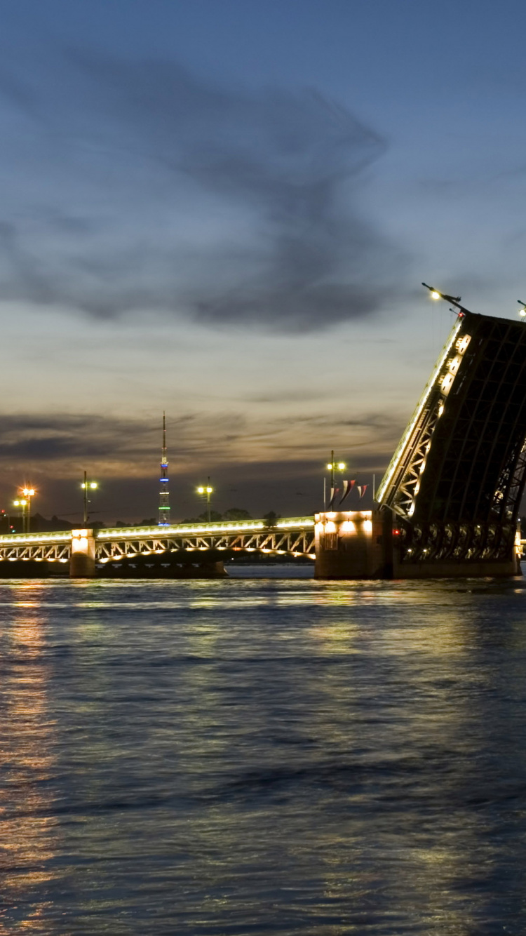 Bridge Over Water During Night Time. Wallpaper in 750x1334 Resolution