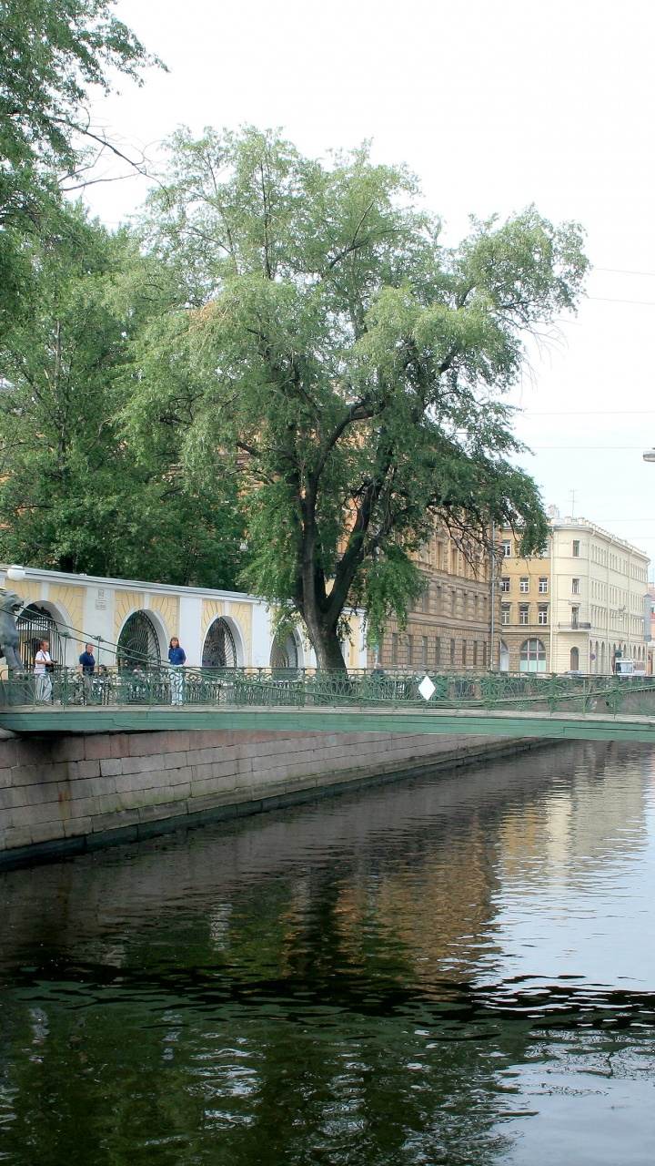 People Walking on Bridge Over River During Daytime. Wallpaper in 720x1280 Resolution