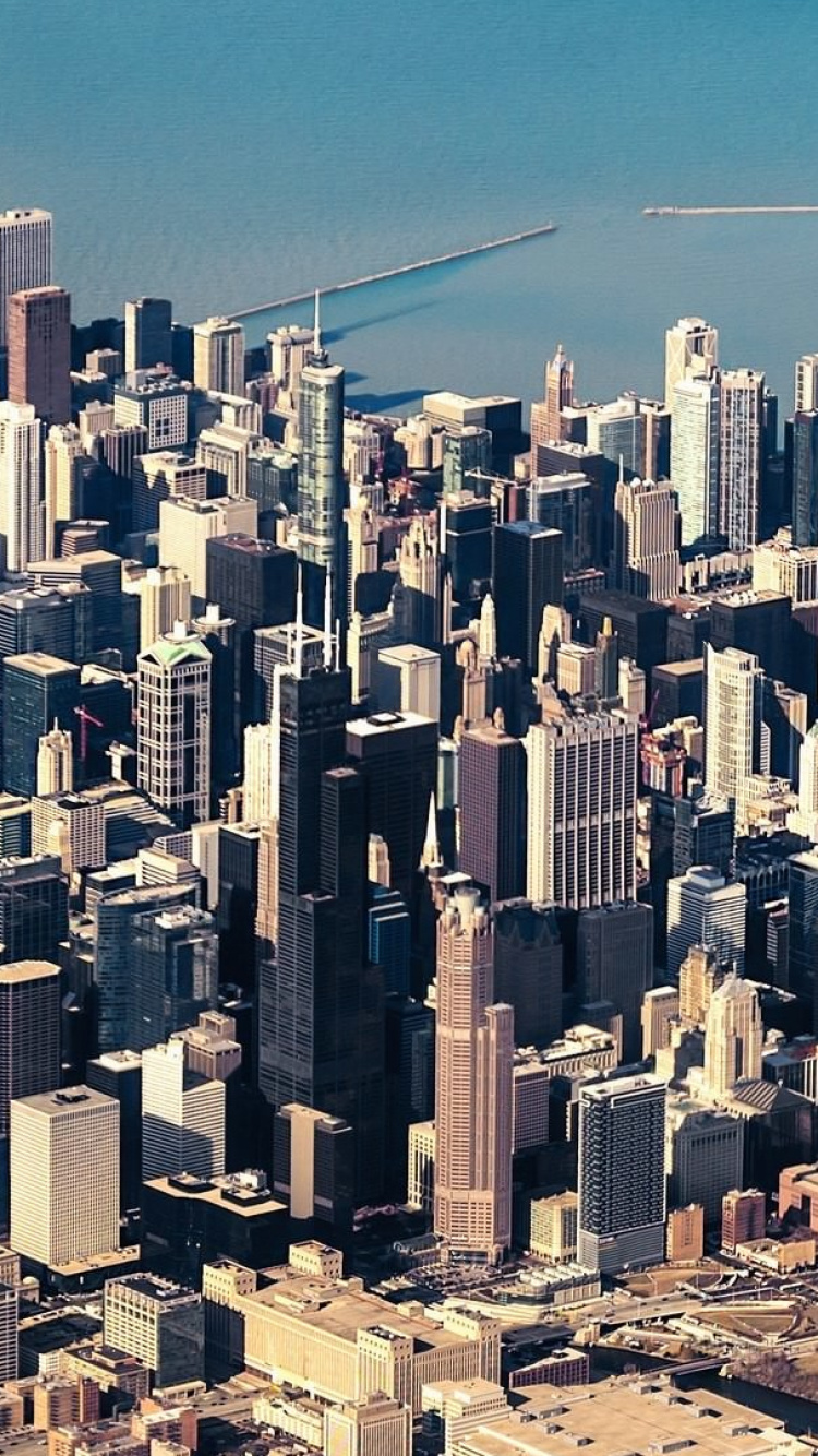 Vue Aérienne Des Bâtiments de la Ville Pendant la Journée. Wallpaper in 750x1334 Resolution