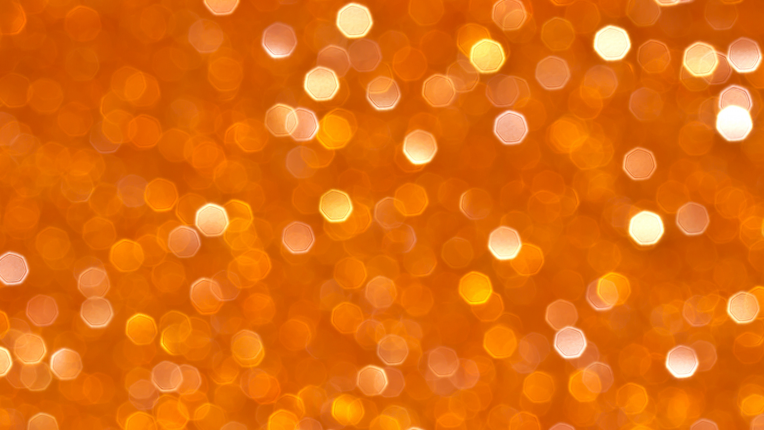 Orange-weiße Bokeh-Lichter. Wallpaper in 2560x1440 Resolution