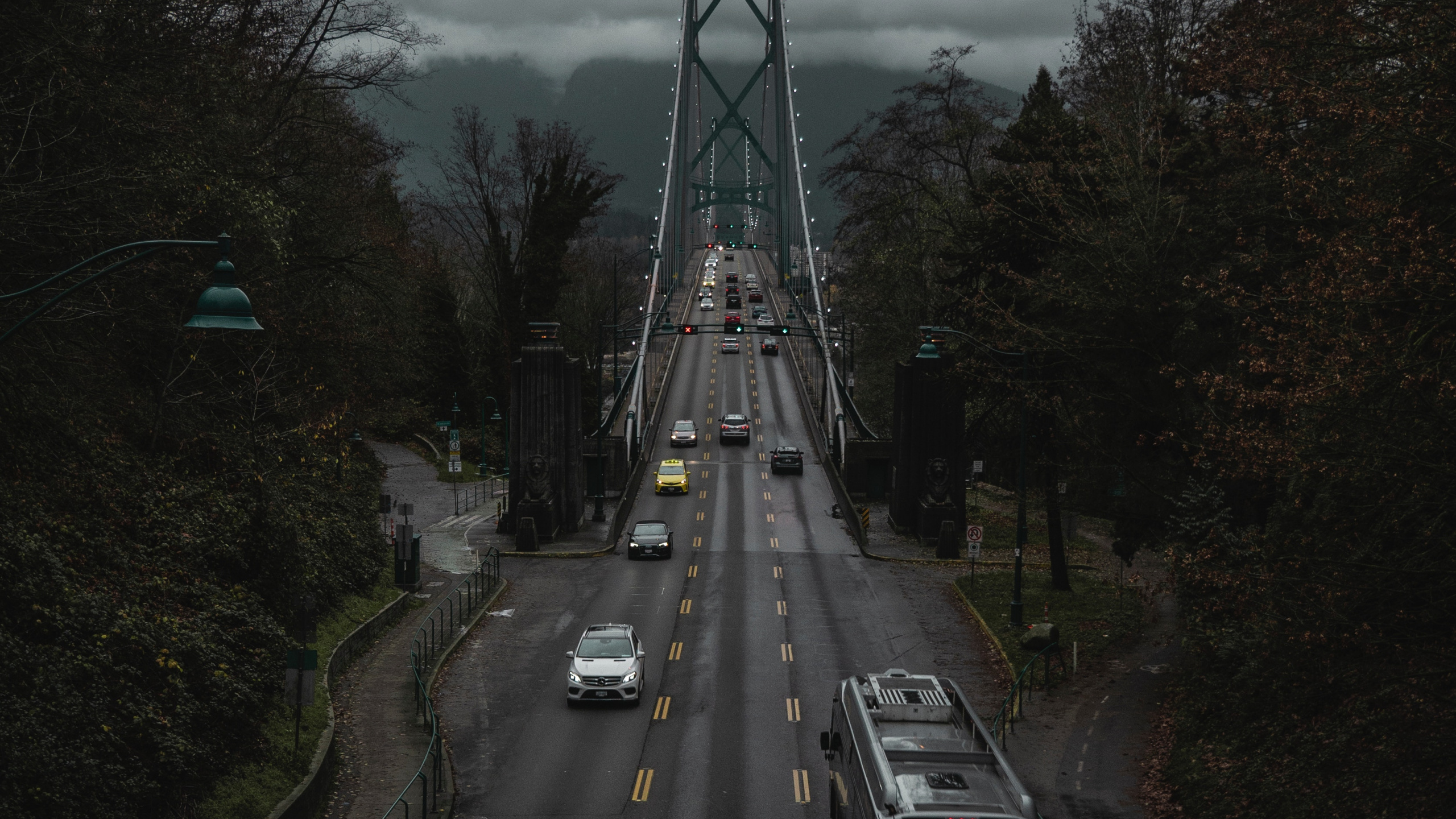 Black Car on Gray Concrete Road. Wallpaper in 2560x1440 Resolution